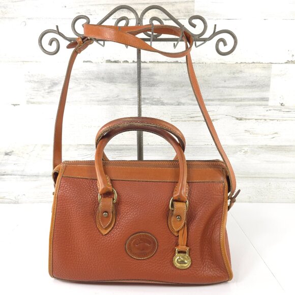 Dooney & Bourke Handbags - VINTAGE DOONEY BOURKE ALL WEATHER LEATHER SATCHEL BAG TAN COLOR CROSSBODY STRAP.